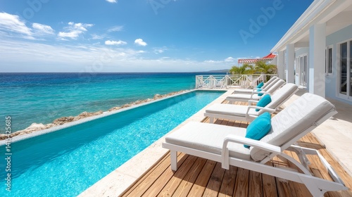 Oceanfront Villa Infinity Pool Luxury Getaway - Stunning ocean view, infinity pool, and luxurious lounge chairs. Perfect tropical vacation escape