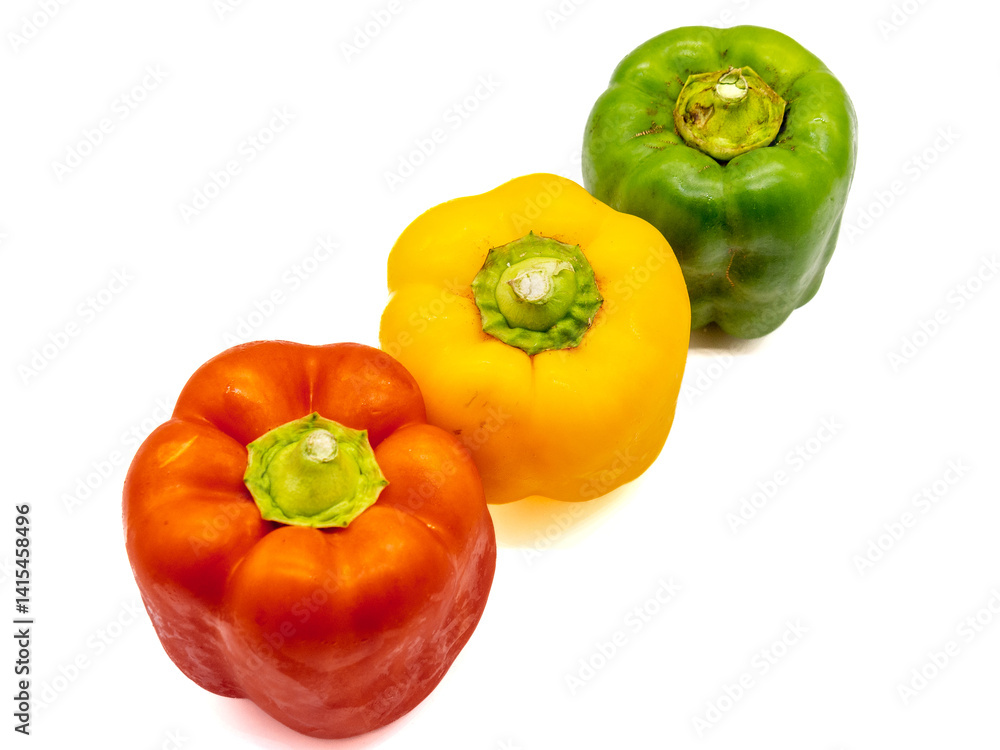 three colored bell peppers isolated on white background