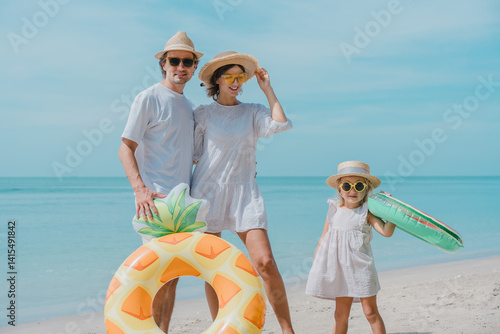 Wallpaper Mural 
 Link ×Title:
Happy family - father, mother, baby son walk with fun along edge of sunset sea surf on black sand beach. Active parents and people outdoor activity on summer vacations with children Torontodigital.ca