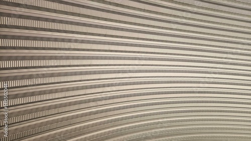 Abstract Metal Texture: This photo captures the abstract beauty of a metal surface, showcasing a mesmerizing arrangement of rippled lines and curved patterns.