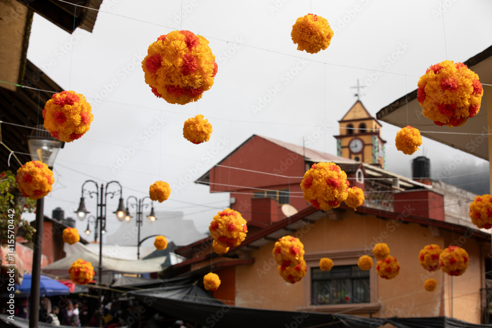 Beautiful Day of the Dead decorations hang in the historic downtown heart of Pinal de Amoles, Querétaro, Mexico.