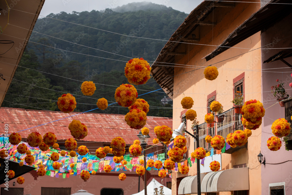 Beautiful Day of the Dead decorations hang in the historic downtown heart of Pinal de Amoles, Querétaro, Mexico.