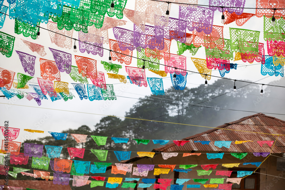 Beautiful Day of the Dead decorations hang in the historic downtown heart of Pinal de Amoles, Querétaro, Mexico.