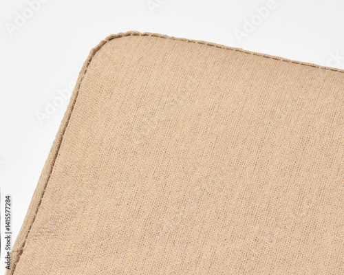 Obraz na płótnie Close-up of beige linen upholstery showing stitching detail w salonie