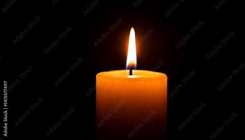 One candle burning slowly isolated on pitch black background One candle burning slowly isolated on pitch black background