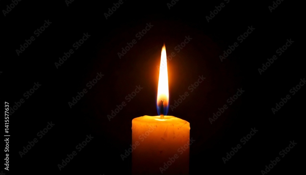 One candle burning slowly isolated on pitch black background One candle burning slowly isolated on pitch black background