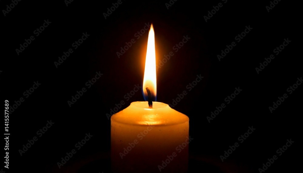 One candle burning slowly isolated on pitch black background One candle burning slowly isolated on pitch black background