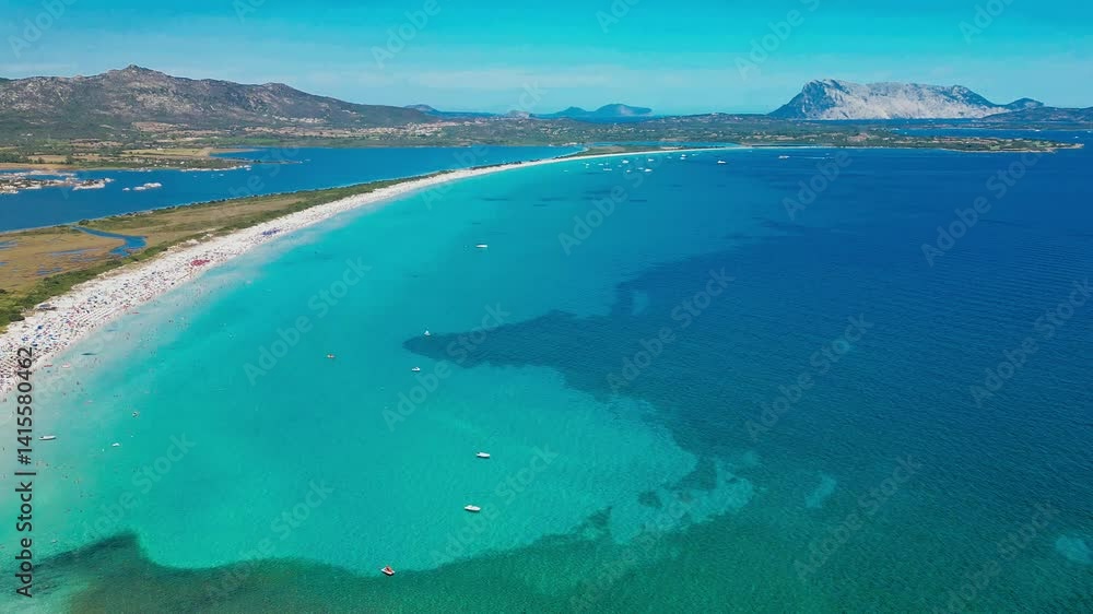 Aerial view of La Cinta beach in Sardinia with turquoise sea Aerial view of La Cinta beach in Sardinia with turquoise sea