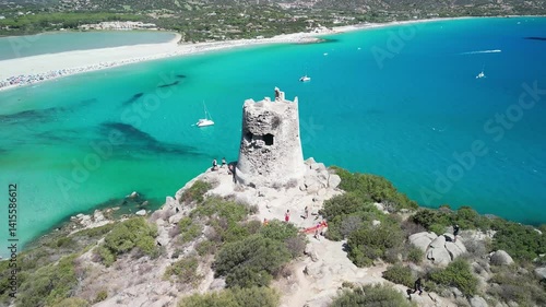 Aerial view of Porto Giunco beach and tower in Villasimius, Sardinia, Italy