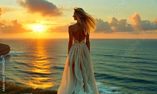 A woman in a flowing dress gazes at a vibrant sunset over the ocean, with clouds scattered in the sky