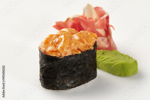 Obraz na płótnie Spicy gunkan maki sushi with spicy sauce, ginger and wasabi on white background w salonie