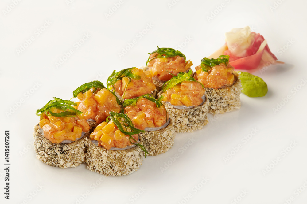 Tempura sushi rolls with spicy salmon and mango toppings presenting delicious japanese cuisine