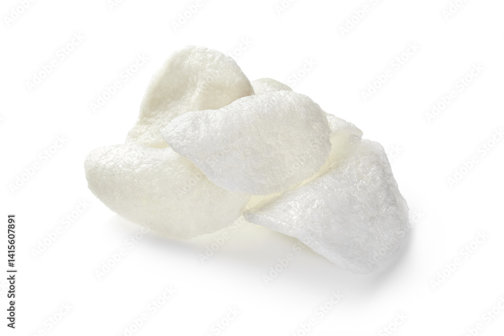 Prawn crackers, small pile of crunchy shrimp chips on white background
