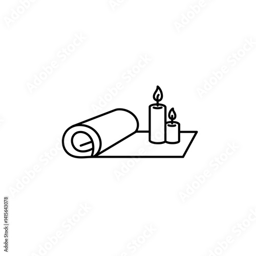 rolled yoga mat with candles on a simple background  
