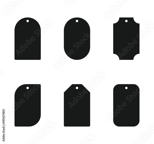 Black price tags on a white background. Cardboard labels with a thread.