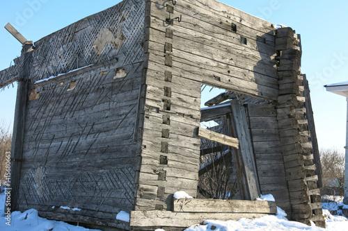 old ruined wooden manor house