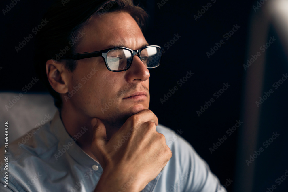 Thinking of stressful financial analyst researching on business paragraph on pc screen with dynamic database marketing analysis planning monthly report at modern home office at night time. Pecuniary. Thinking of stressful financial analyst researching on business paragraph on pc screen with dynamic database marketing analysis planning monthly report at modern home office at night time. Pecuniary.