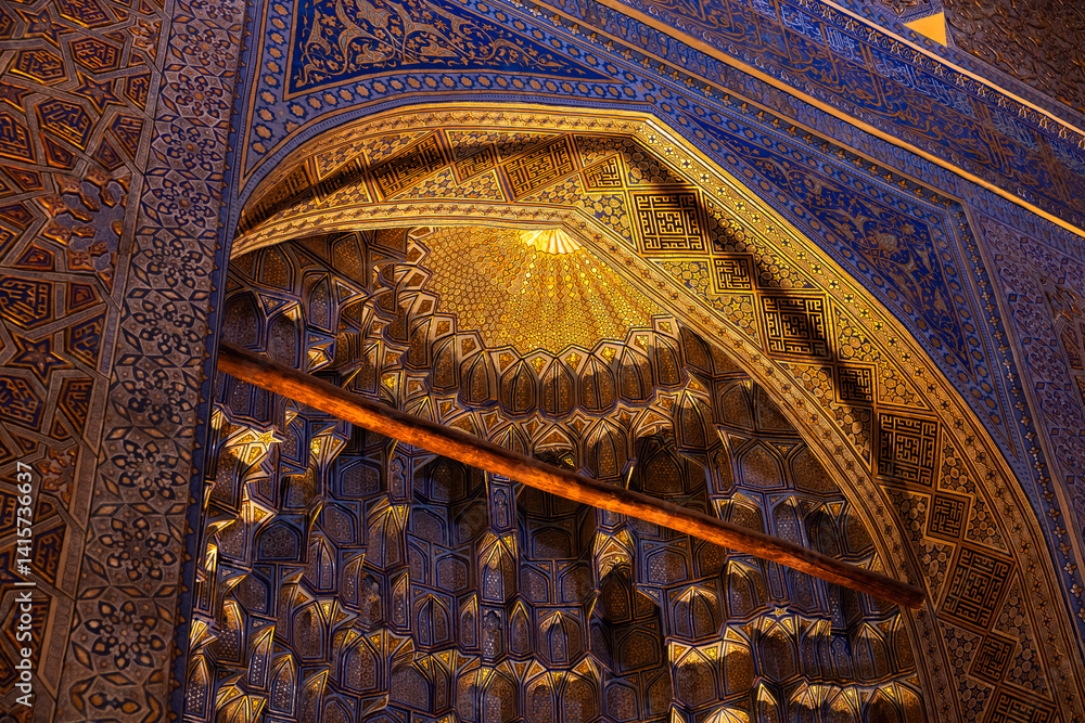 Mausoleum interior details, deep niches and diverse muqarnas decoration.