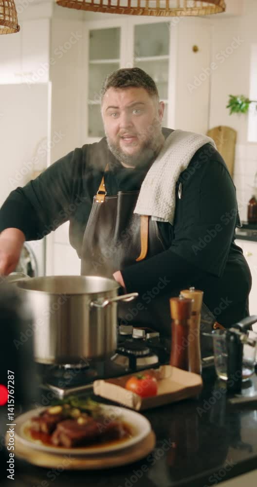 Cooking, live streaming and man in kitchen with food for culinary lesson, meal tutorial and dinner in home. Camera, influencer and chef with ingredients for nutrition, gourmet recipe and cuisine Cooking, live streaming and man in kitchen with food for culinary lesson, meal tutorial and dinner in home. Camera, influencer and chef with ingredients for nutrition, gourmet recipe and cuisine