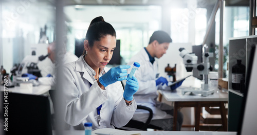 Tableau sur toile Woman, scientist and vial with chemical compound for medical research, exam or test results at lab