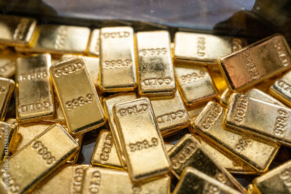 gold bars on black background gold bars on black background