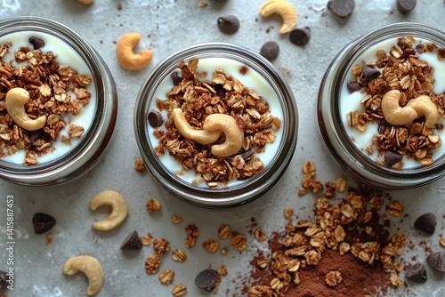 Homemade Granola Parfaits With Yogurt, Nuts, and Chocolate Chips Arranged on ...