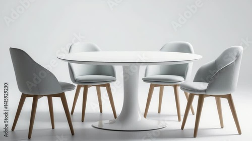 Round white table accompanied by three chairs positioned against a white backdrop.
