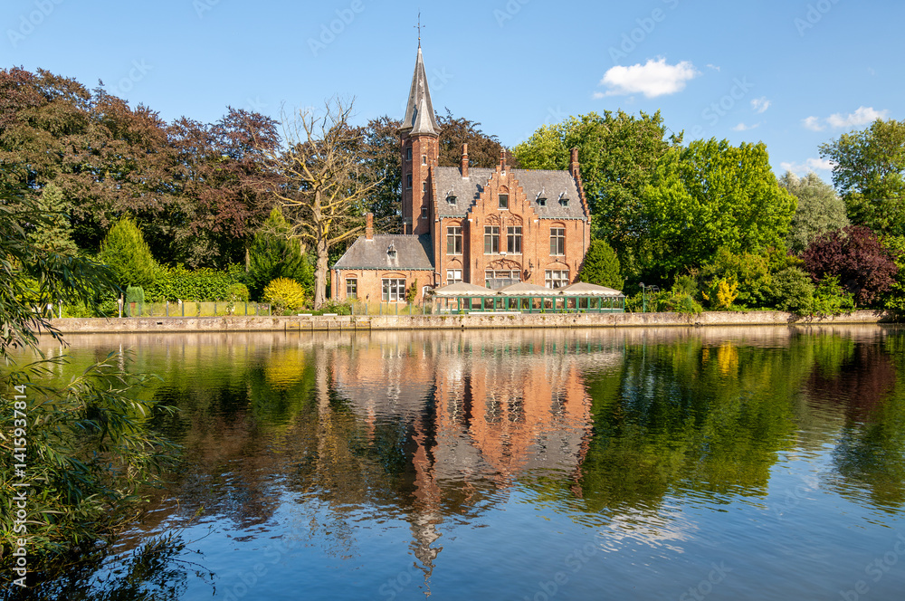 An old historic church Castillo de La Faille by the Minne lake in Bruge, Belgium. An old historic church Castillo de La Faille by the Minne lake in Bruge, Belgium.