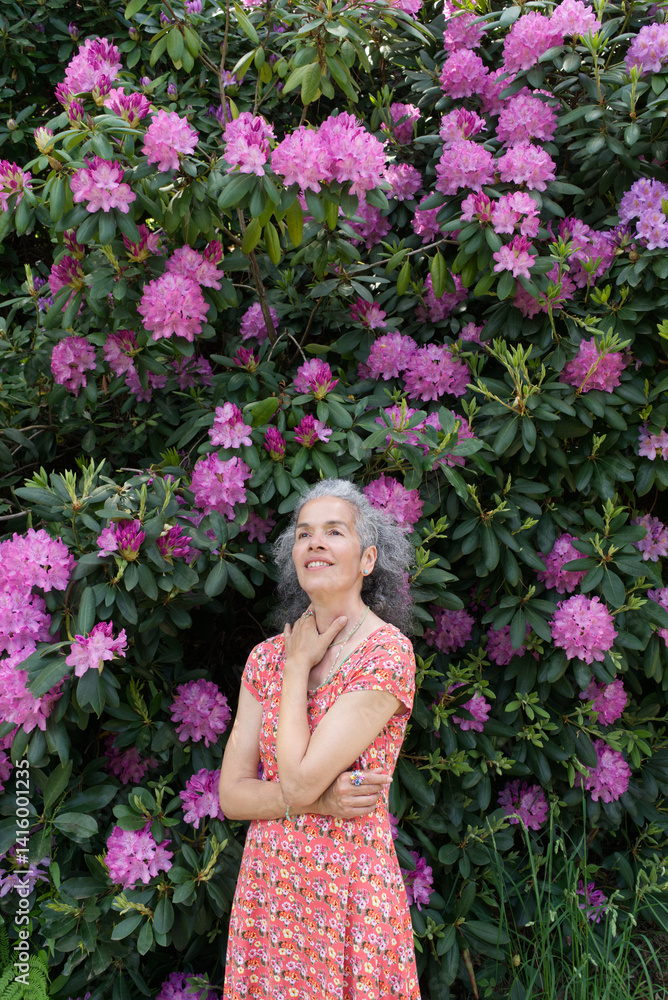 Mature woman Rhododendron flowers Mature woman Rhododendron flowers