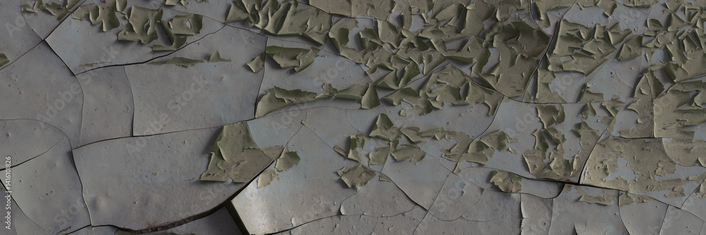 Peeling paint on the wall. Panorama of a concrete wall with old cracked flaking paint. Weathered rough painted surface with patterns of cracks and peeling. Wide panoramic grunge texture for background
