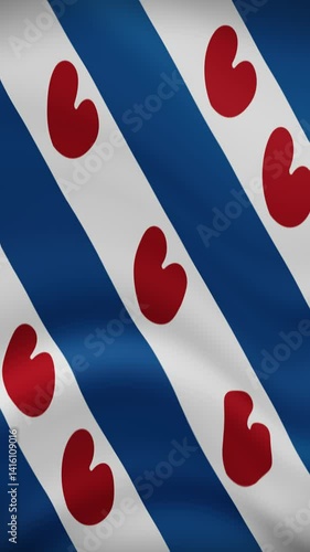 Frisian Waving Flag in Vertical Orientation. Realistic Flag Animation. Seamless Loop Background.