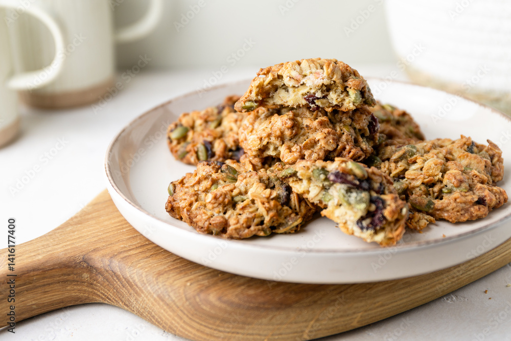 Homemade oatmeal cookies with cranberries and pumpkin seeds. Healthy diet snack. Homemade oatmeal cookies with cranberries and pumpkin seeds. Healthy diet snack.