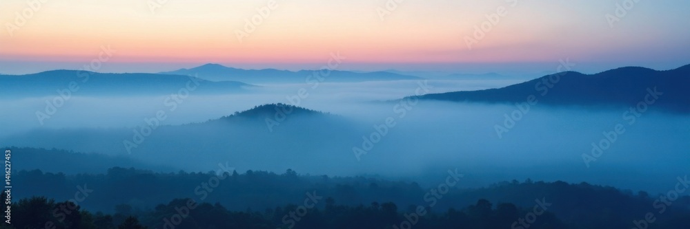 Fototapeta premium Misty morning fog rolling over a vast expanse of deep indigo blue landscape, landscape, fog