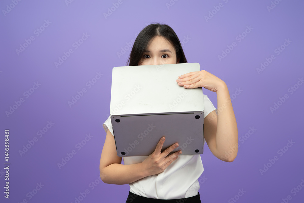 Asian girl is posing in front of a background Asian girl is posing in front of a background