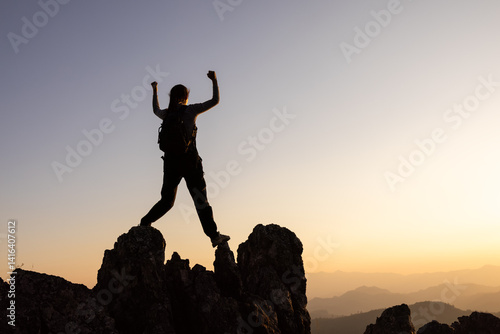 Wallpaper Mural Woman climber success silhouette in mountains, achievement inspiration, Concept motivation and goal achievement. Torontodigital.ca