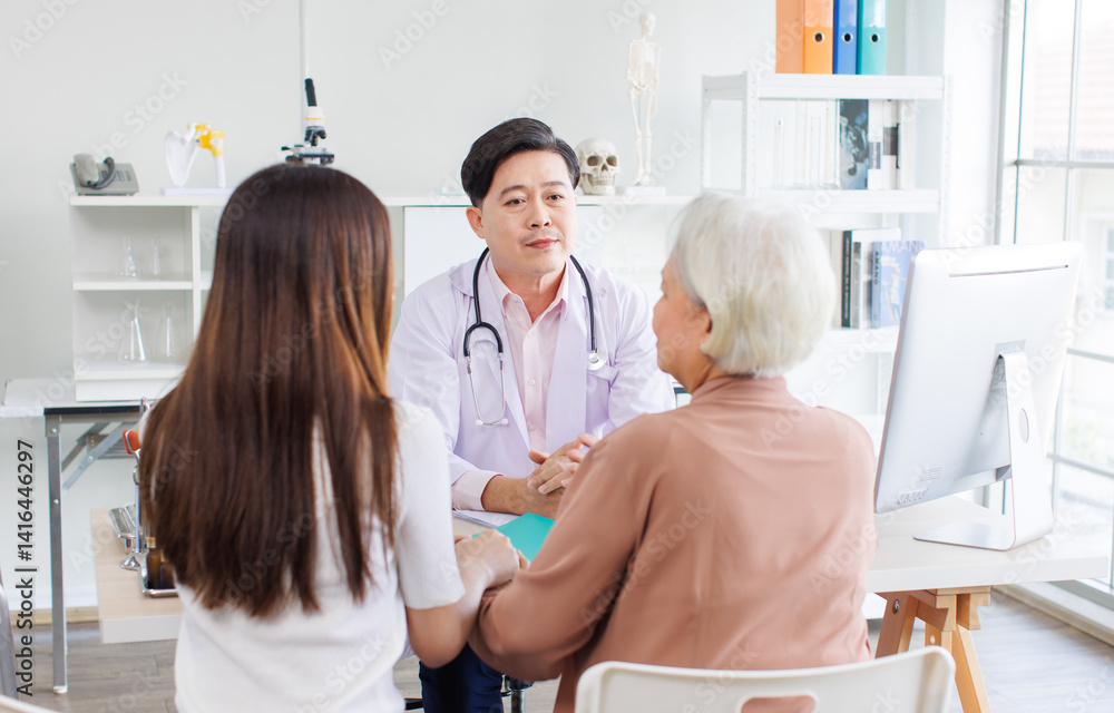 Asian doctor confident consultation with retired old woman and patient relatives in clinic hospital discussion to illness senior medical professional at desk with support, Medicine health care concept
