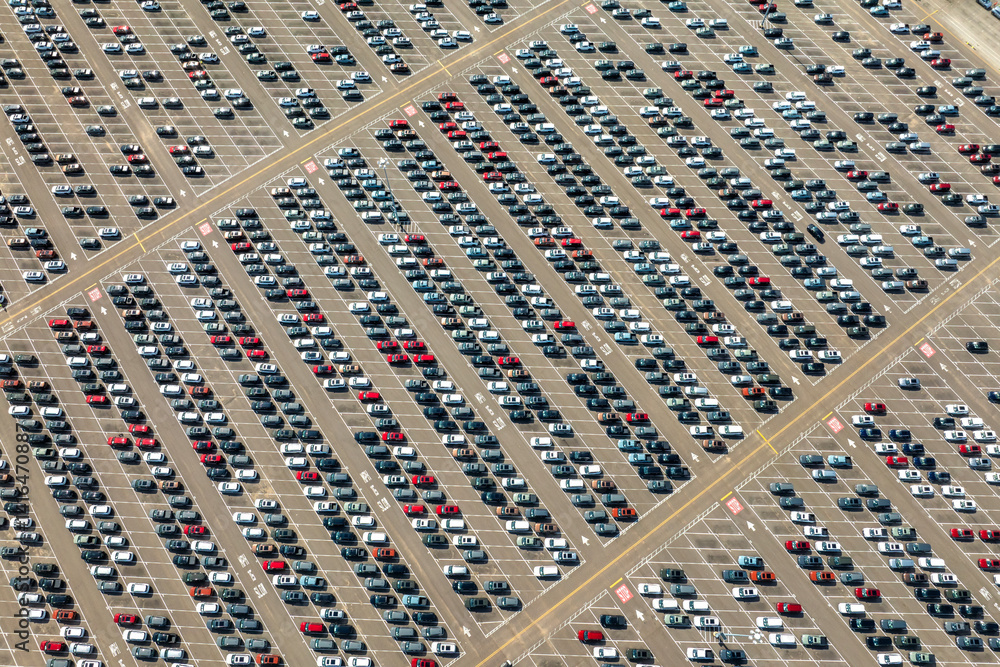 Obraz premium Cars parked ready for sale on automotive factory parking lot
