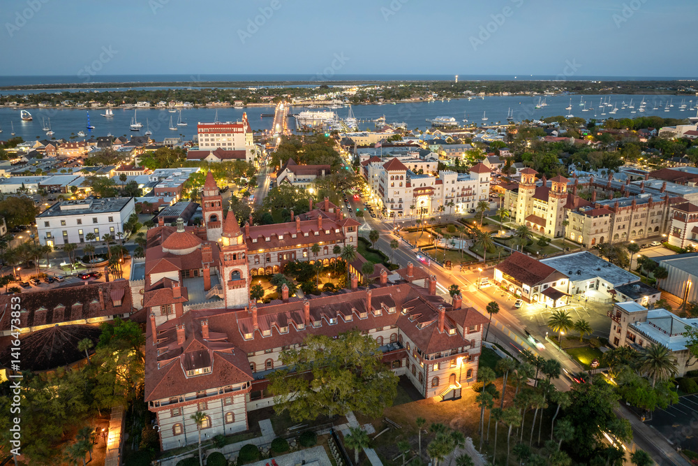 Fototapeta premium Old town America architecture. Aerial view of Flagler College campus in St. Augustine city in Florida at night