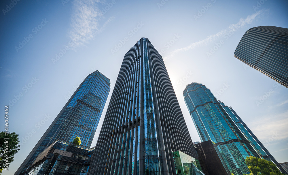 Breathtaking View of Modern Skyscrapers Against a Clear Blue Sky Breathtaking View of Modern Skyscrapers Against a Clear Blue Sky