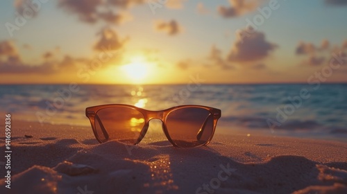 Wallpaper Mural Sunglasses on sandy beach at sunrise: capturing serene coastal relaxation and tranquil summer moments. Torontodigital.ca
