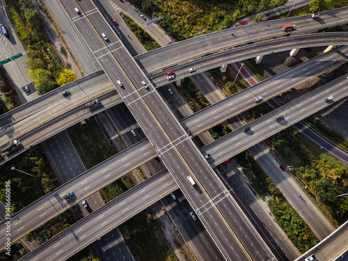 Obraz na płótnie Aerial view intersection transport cross road building with traffic vehicle w salonie
