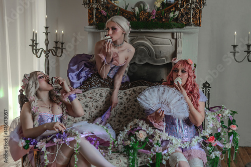 A girl dressed in the style of a Victorian boudoir, in a corset and crinoline of lilac color, in flowers