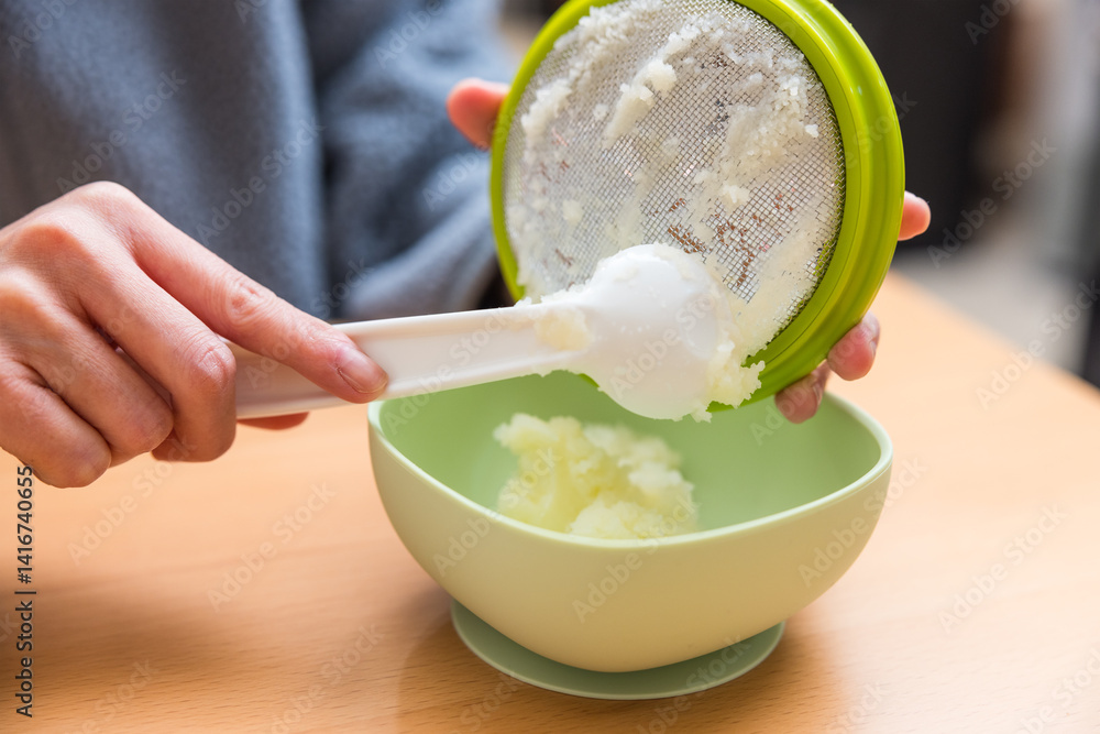Preparing fresh homemade baby food at home
