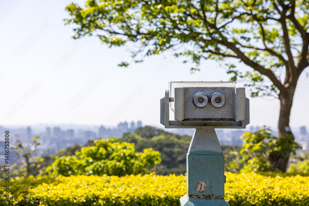Binoculars on mountain top for sightseeing view