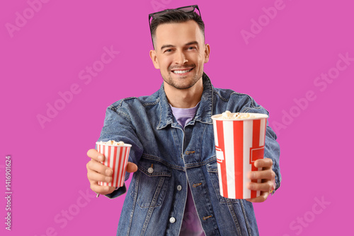 Happy young man with 3D gla...