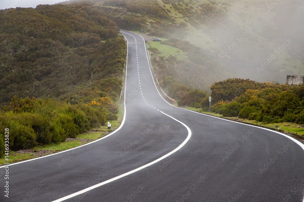 road on a foggy rainy day