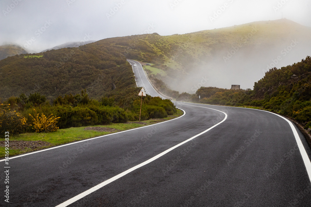 road on a foggy rainy day