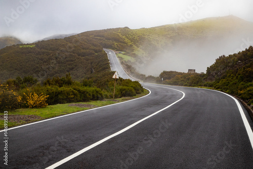 road on a foggy rainy day