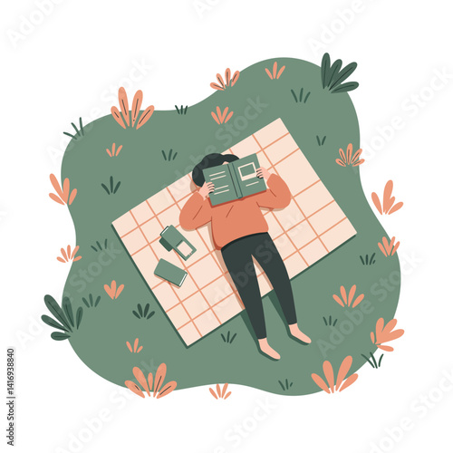 Man lying barefoot on a blanket in grass reading a book with two closed books nearby during a calm outdoor moment