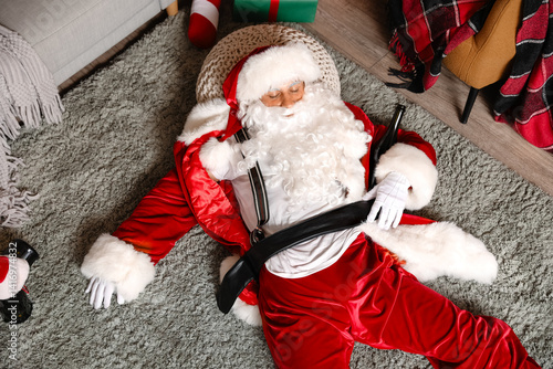 Drunk Santa Claus with bott...